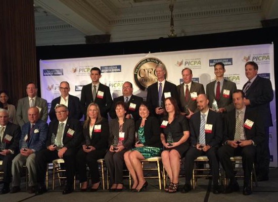 MFR's CFO Andrew with other people awarded by the Philadelphia business journal