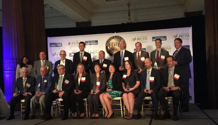 MFR's CFO Andrew with other people awarded by the Philadelphia business journal